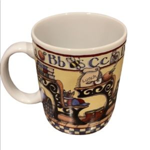 Coffee/Tea mug Lang & Wise “All Checked Out” 1998